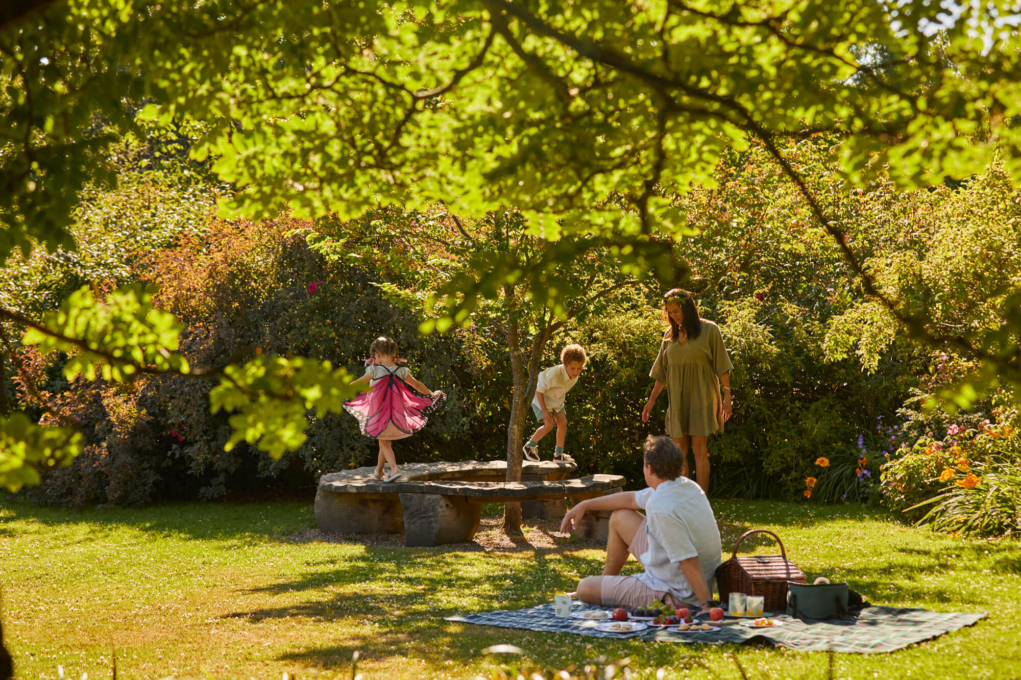 A family enjoying a summer picnic at Borde Hill.