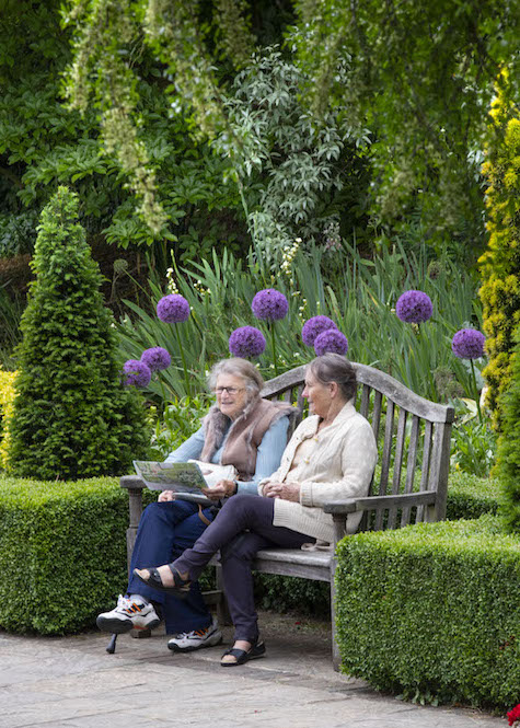 Visitors relaxing in the Italian Garden at Borde Hill