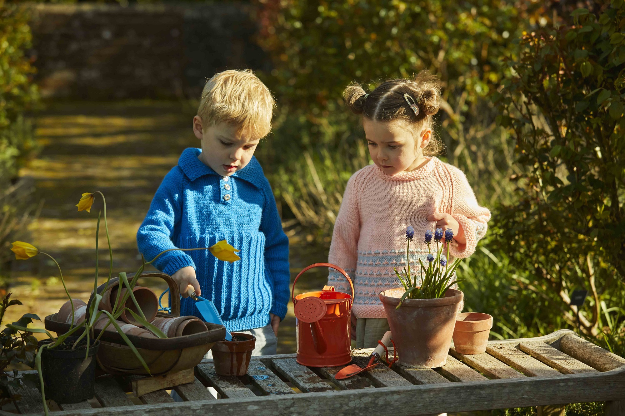 Two children potting plants at Borde Hill. Image: Emli Bendixen